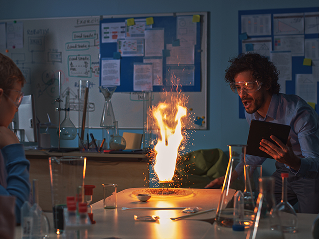 Physics teacher doing an experiment